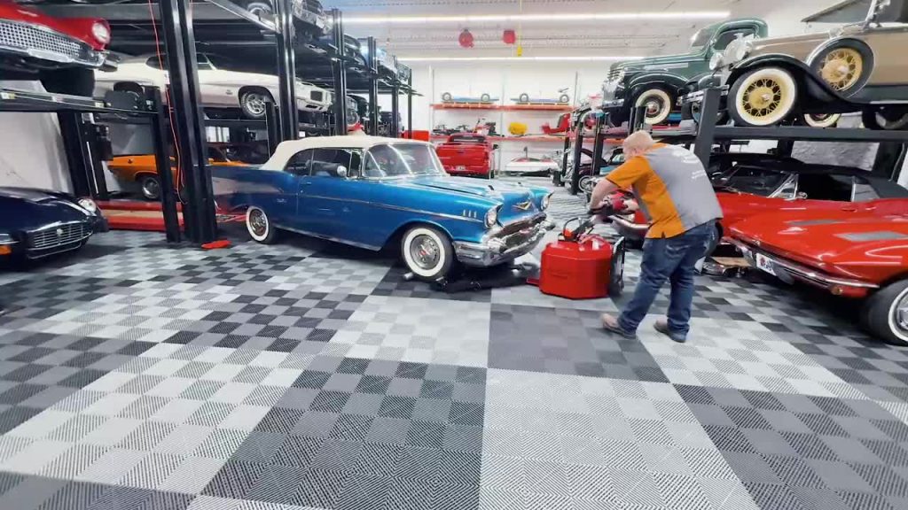 Powered Car Puller Vehicle Mover adjusting the position of a classic car.