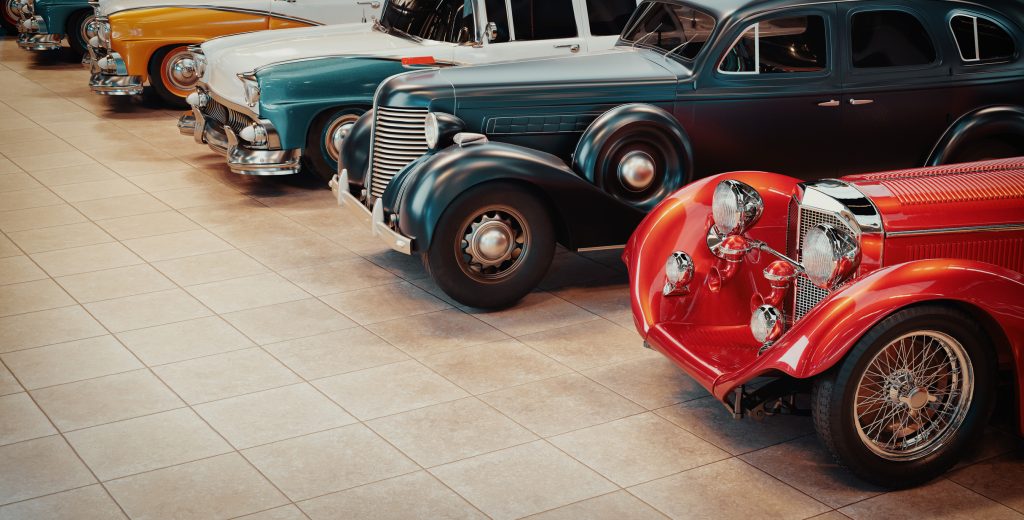 A Row of Classic Cars in a Tight Space